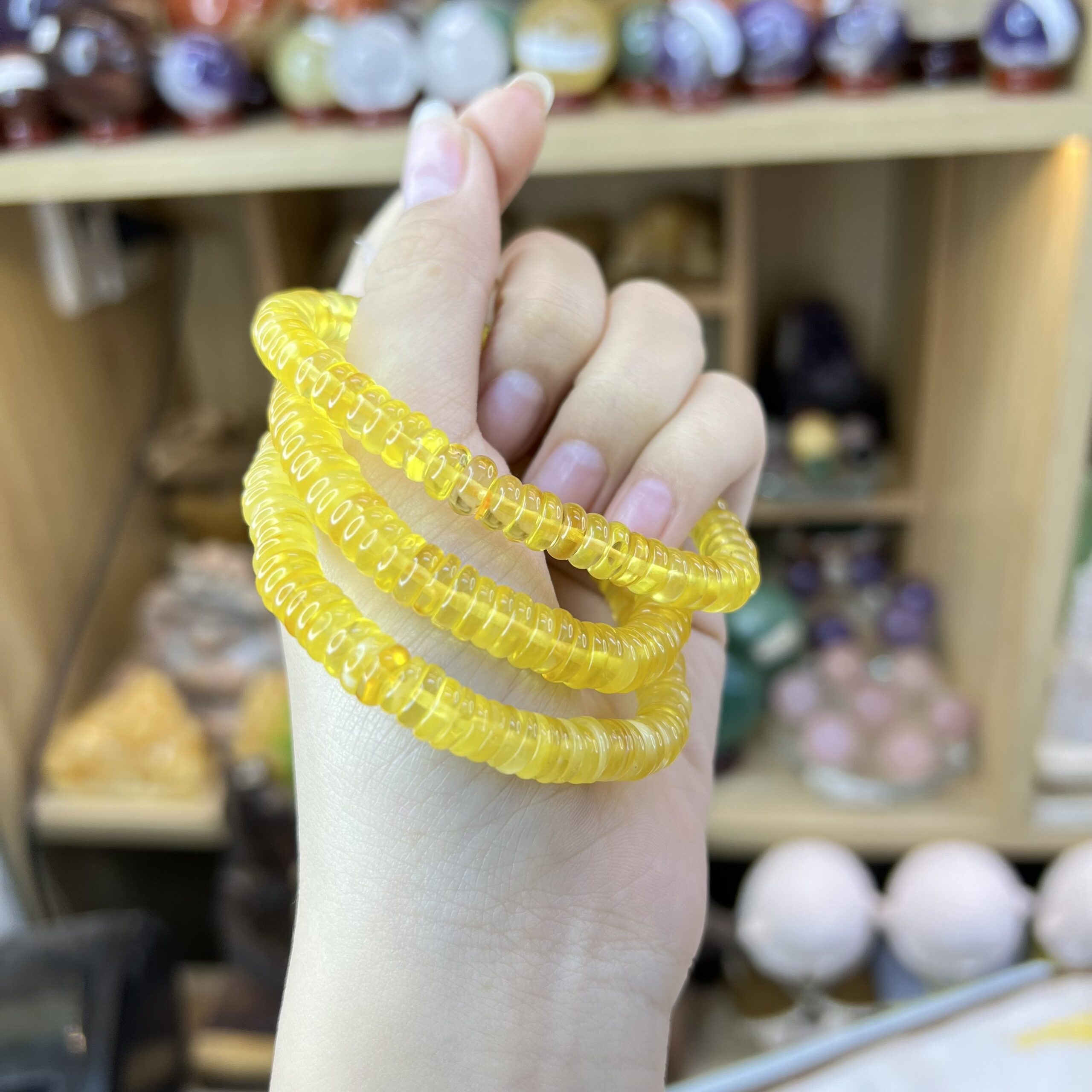 Chuỗi Hổ Phách Vàng Bánh Xe