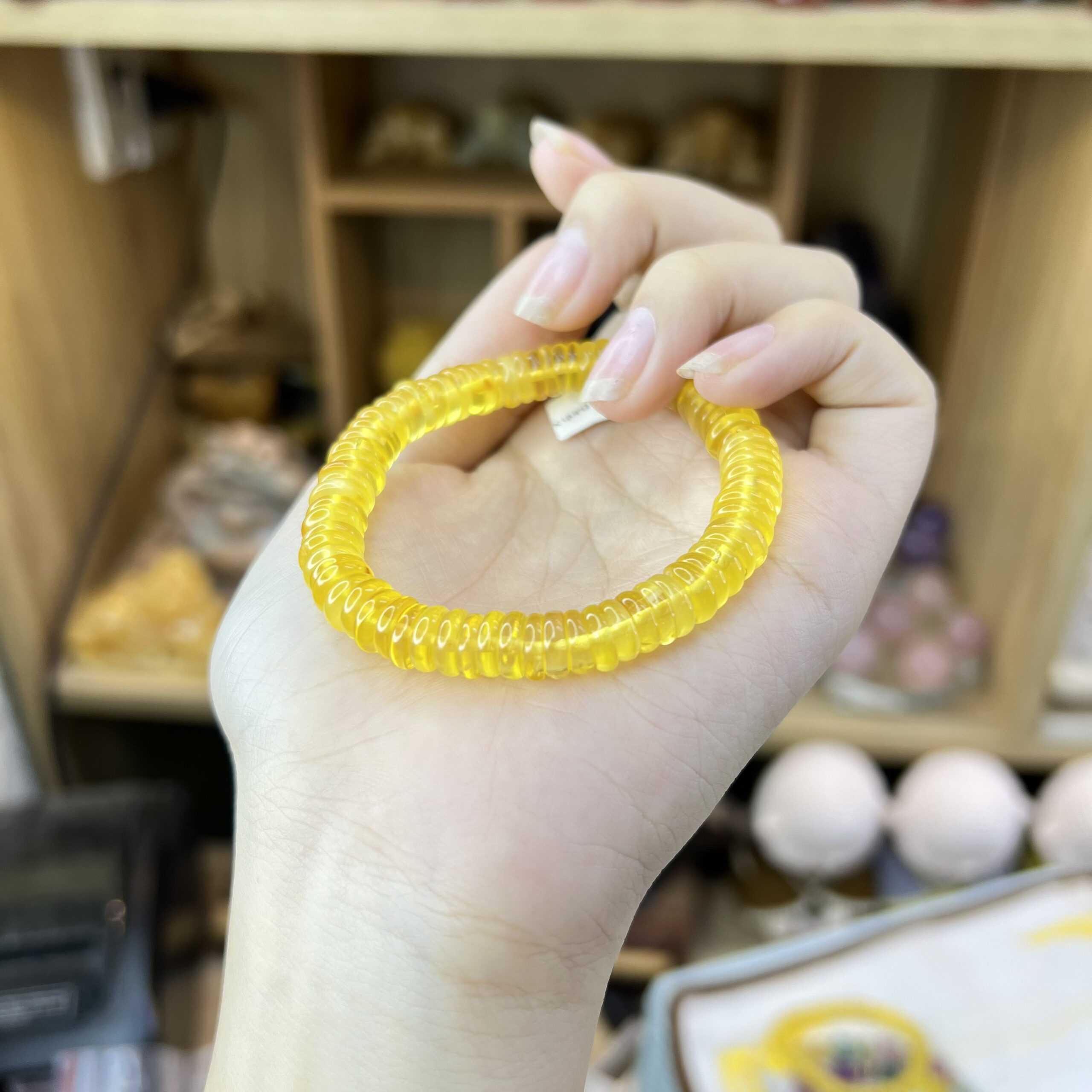 Chuỗi Hổ Phách Vàng Bánh Xe