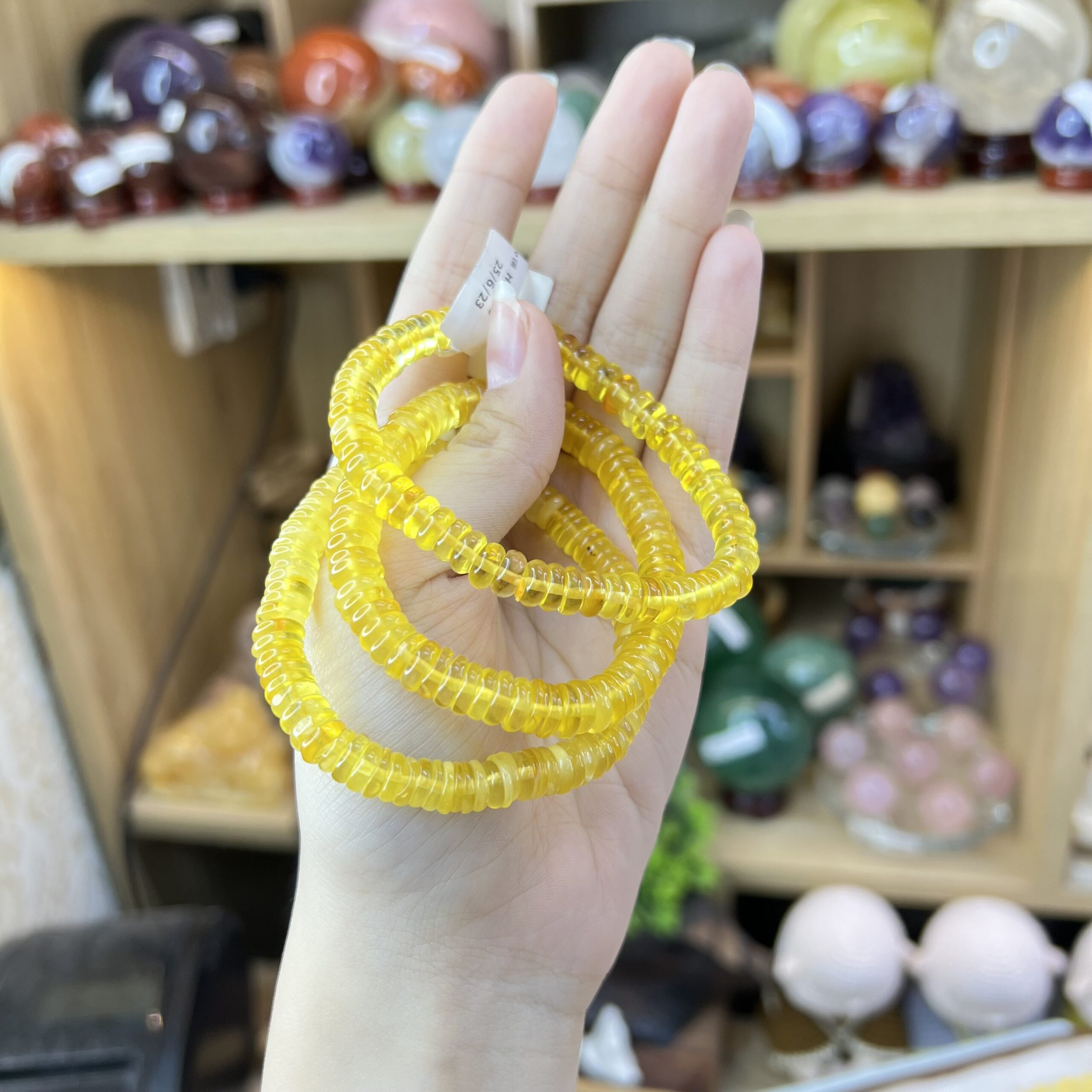 Chuỗi Hổ Phách Vàng Bánh Xe